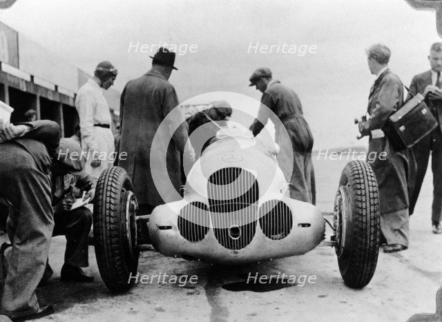 Mercedes-Benz W125 Grand Prix car at the Nurburgring, Germany, 1937. Artist: Unknown