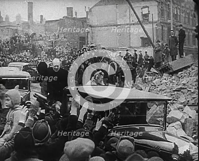 Winston Churchill and Clementine Churchill Driving Through Bombed Out Buildings, 1941. Creator: British Pathe Ltd.