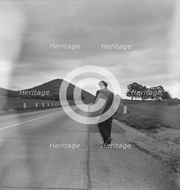 The trek of bums, tramps, single transients, and undesirable indigents..., California, 1936. Creator: Dorothea Lange.