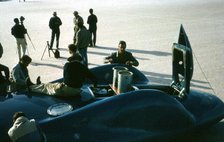 Mechanics working on Bluebird CN7 at lake Eyre for World Land speed record attempt, 1964. Creator: Unknown.