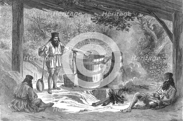 'Wallachians Distilling 'Slievovitz'; A Visit to the Danubian Principalities', 1875. Creator: Nelson Boyd.
