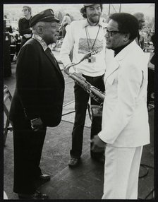 Count Basie chatting with Illinois Jacquet at the Capital Radio Jazz Festival, London, July 1979. Artist: Denis Williams