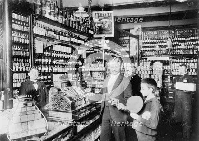 Unidentified grocery store, probably in Germany, between 1900 and 1910. Creator: Unknown.