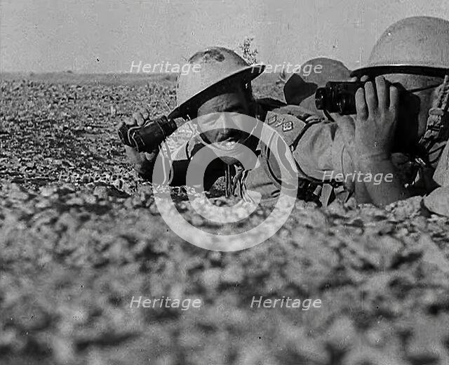 British Soldiers Observing Artillery, 1942. Creator: British Pathe Ltd.