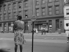 Waiting for the street car at 7th and Florida Avenue, N.W., Washington, D.C., 1942. Creator: Gordon Parks.