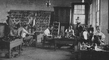 Shoe shop making and repairing, 1904. Creator: Frances Benjamin Johnston.