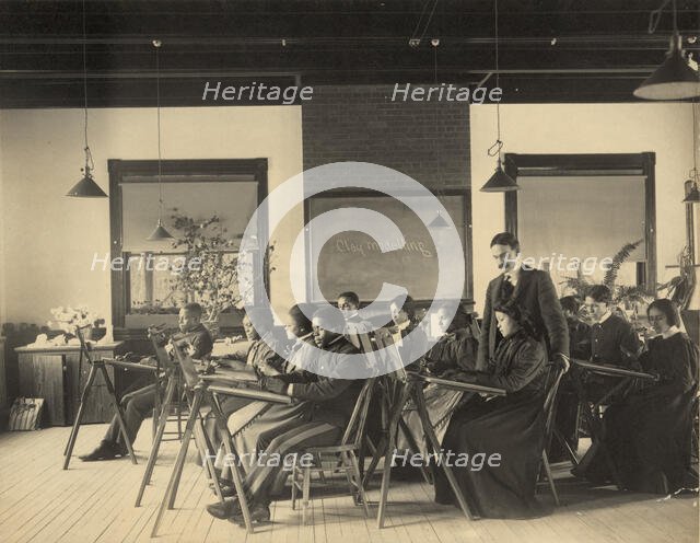 Formal class in liberal arts and sciences Hampton Institute, Hampton, Va. -writing..., 1899 or 1900. Creator: Frances Benjamin Johnston.