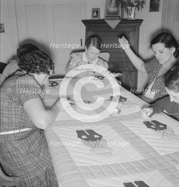 Farm women working on quilt, near West Carlton, Yamhill County, Oregon, 1939. Creator: Dorothea Lange.