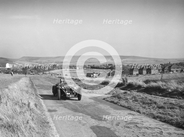 Invicta S Type Red Gauntlet of D Monro at the Bugatti Owners Club Lewes Speed Trials, Sussex, 1937. Artist: Bill Brunell.