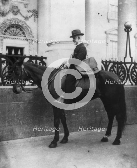 A messenger (Beckley) on horseback in front of the White House, n.d.. Creator: Unknown.