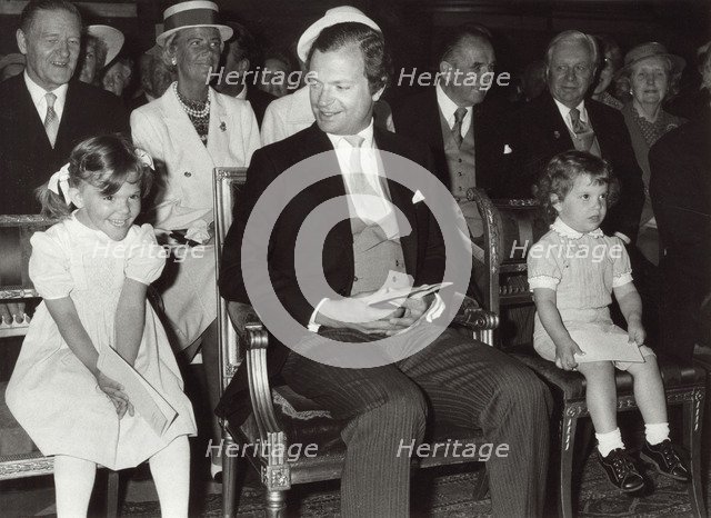 King Carl XVI Gustav of Sweden with Princess Victoria and Prince Carl Philip, 1982. Artist: Unknown