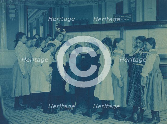 Students from 6th Division public schools, Washington DC, looking at...Library of Congress, (1899?). Creator: Frances Benjamin Johnston.