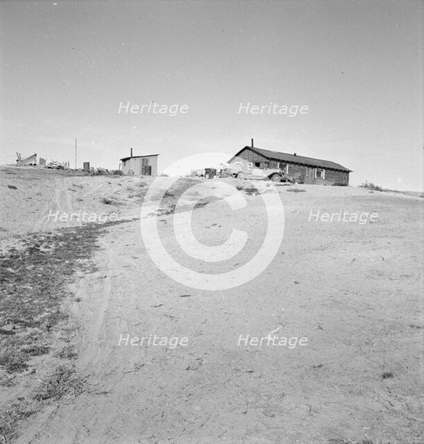 The Browning home, a partial dugout, Dead Ox Flat, Malheur County, Oregon, 1939. Creator: Dorothea Lange.