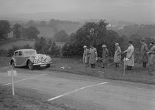 Jaguar SS saloon of BA Hickman competing in the South Wales Auto Club Welsh Rally, 1937 Artist: Bill Brunell.