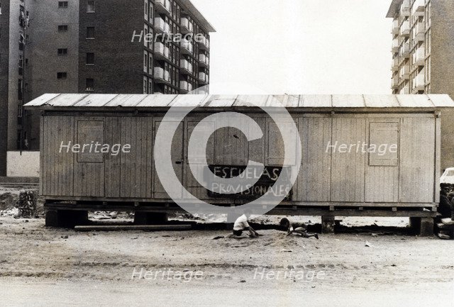 Barracks installed in San Adrián in Southwest of the Besòs river, provisionally used as schools, …