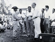 Fritz Ronnefeldt distributing medicine, c1940s. Creator: Unknown.