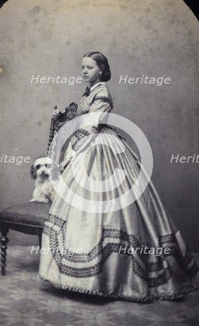 Studio portrait of an 18 year old girl in an ankle-length dress, c1856. Artist: Unknown