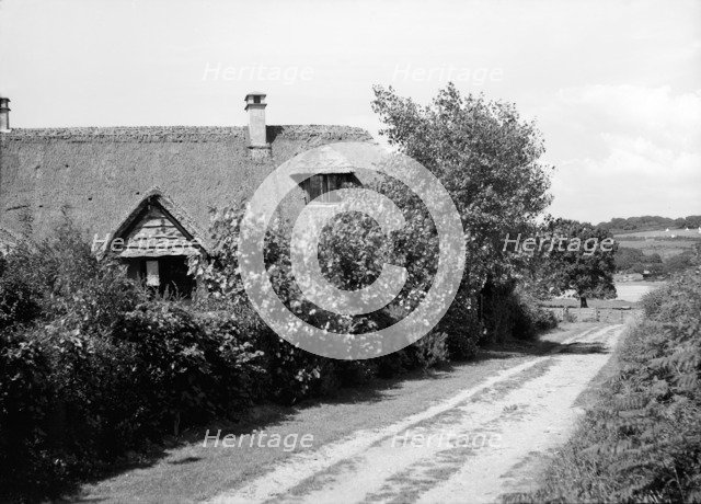 Thatched cottage, c1935. Creator: Kirk & Sons of Cowes.