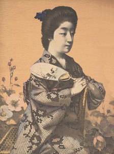 Girl Carrying a Round Paper Fan (Uchiwa), ca. 1900? Creators: Unknown, Hugechi.