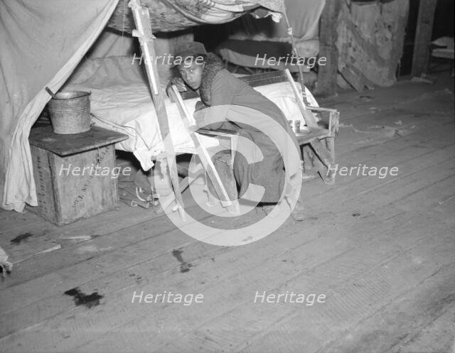 Negro girl in the temporary infirmary, Forrest City, Arkansas, 1937. Creator: Walker Evans.