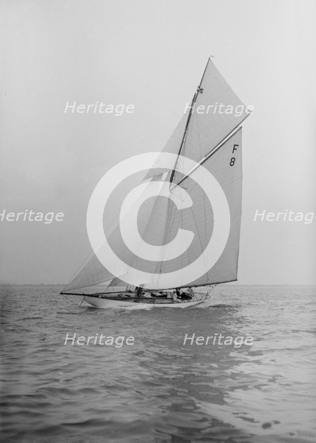 The International 10 Metre class 'Pampero' (F8) sailing close-hauled, 1913. Creator: Kirk & Sons of Cowes.