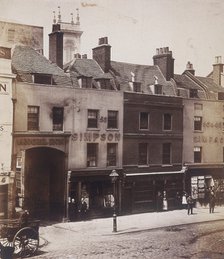 Angel Inn and shops on Farringdon Street, London, c1860. Artist: Henry Dixon