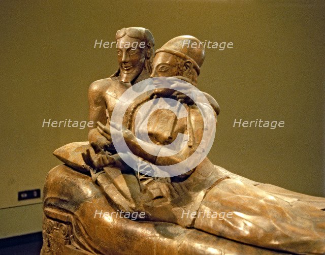 Detail of the figures of an Etruscan sarcophagus of the spouses, made in terracotta.