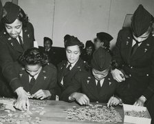 Two African American Lieutenants of the Women's Army Corps sitting at a table and..., 1939 - 1945. Creator: Unknown.