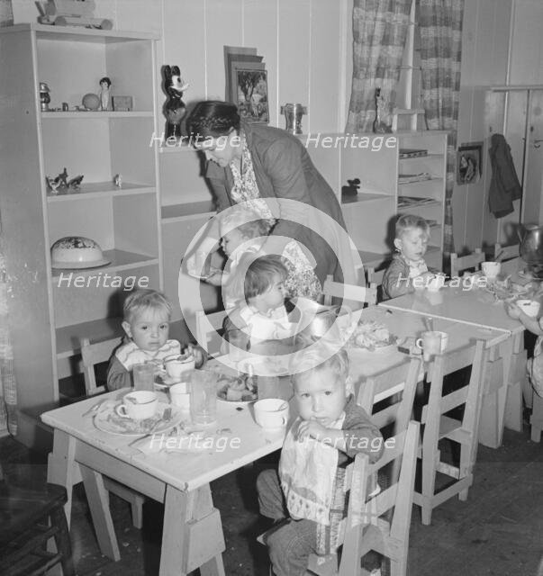 Lunchtime for young migrants at Shafter Camp, California, 1939. Creator: Dorothea Lange.