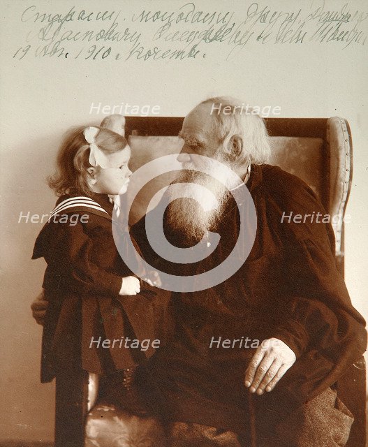 Russian author Leo Tolstoy with his granddaughter Tatiana, Yasnaya Polyana, Russia, c1910.  Artist: Vladimir Grigorievich Chertkov