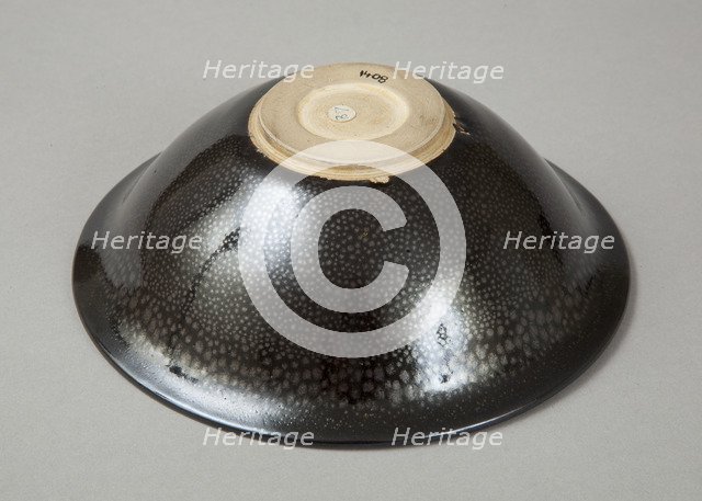 A 20th century copy of buff-bodied Cizhou-type bowl with oil spot glaze, 20th century. Artist: Unknown.