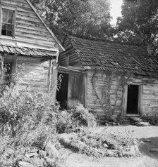House and yard of Negro owner, 1939. Creator: Dorothea Lange.