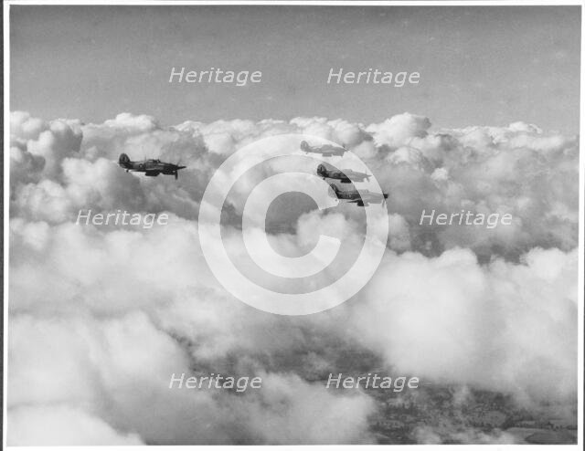 RAF Film Production Unit film still showing a 'hurribomber' in flight, 1942. Creator: Royal Air Force Fim Production Unit.