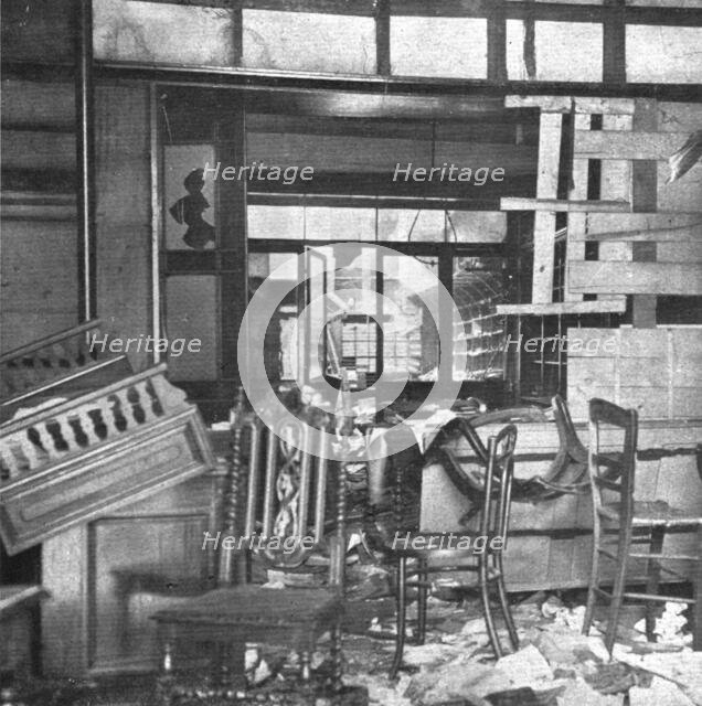 'Nos villes a sac; L'interieur d'une librairie: comment les Allemands se comporterent a..., 1918. Creator: Unknown.