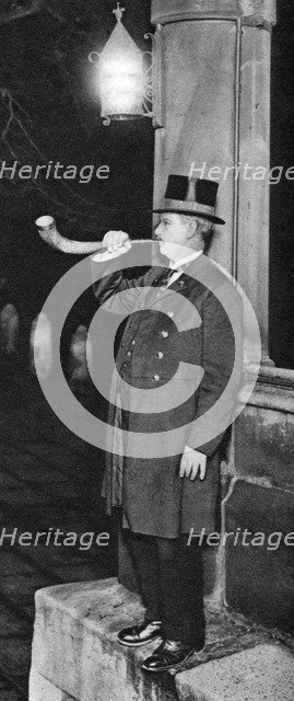 Panyer-man blowing a silver mounted ox-horn, Middle Temple Hall, London, 1926-1927. Artist: Unknown