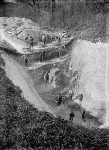 Excavation at Avebury, Wiltshire, 1922. Artist: Harold St George Gray