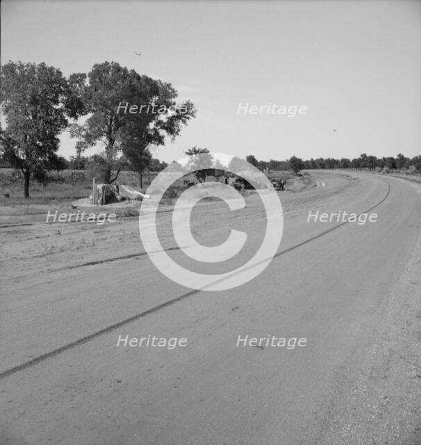 Family camped on U.S. Highway 63, Cache County, Oklahoma, 1937. Creator: Dorothea Lange.