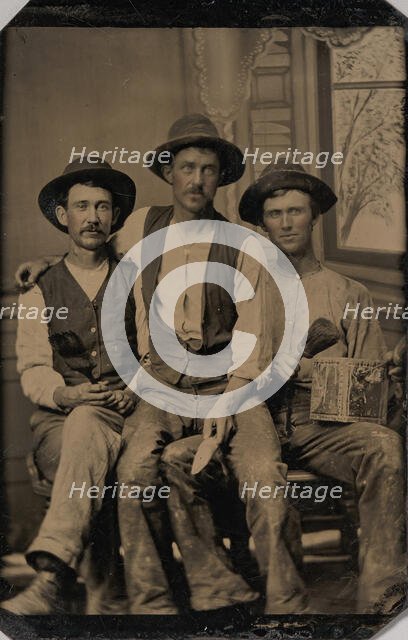 Three Painters, with Brushes and a Can of Paint, in Front of a Painted Window Backdrop, 1870s-80s. Creator: Unknown.