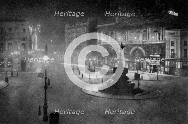 Piccadilly Circus, London, at night, 1908-1909.Artist: Charles F Borup