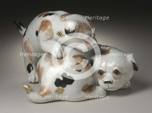 Okimono in the Form of a Pair of Gamboling Piebald Puppies, 19th century. Creator: Unknown.