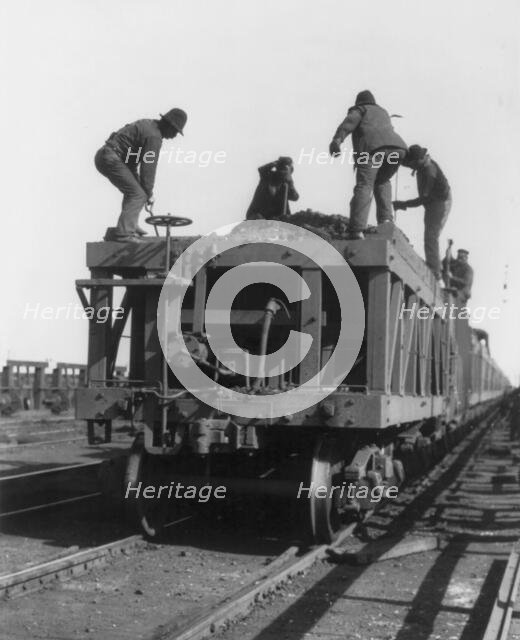 Ore cars at the docks in Duluth, Minnesota, Oct. 31, 1903. Creator: Frances Benjamin Johnston.