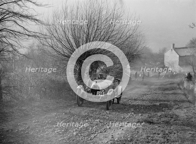 HE 14/40 taking part in a winter motoring trial, c1930s. Artist: Bill Brunell.