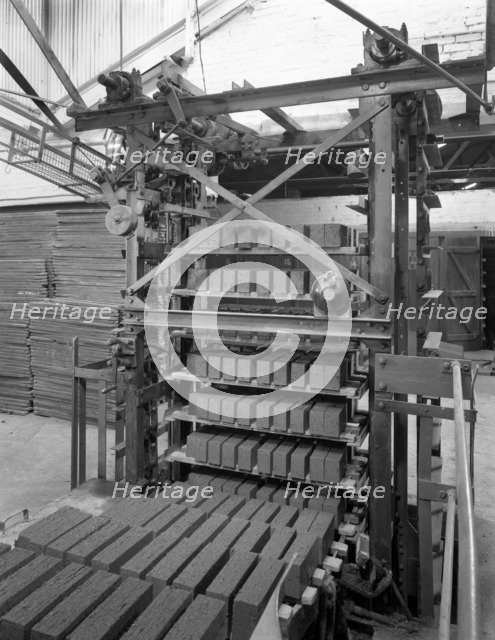 Palletising machine at Whitwick Brickworks, Coalville, Leicestershire, 1963. Artist: Michael Walters