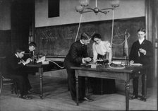 Students in a science class conducting experiments, Western High School, Washington, D.C., (1899?). Creator: Frances Benjamin Johnston.