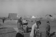 Facilities for washing in the camp for white flood...at Forrest City, Arkansas, 1937. Creator: Walker Evans.