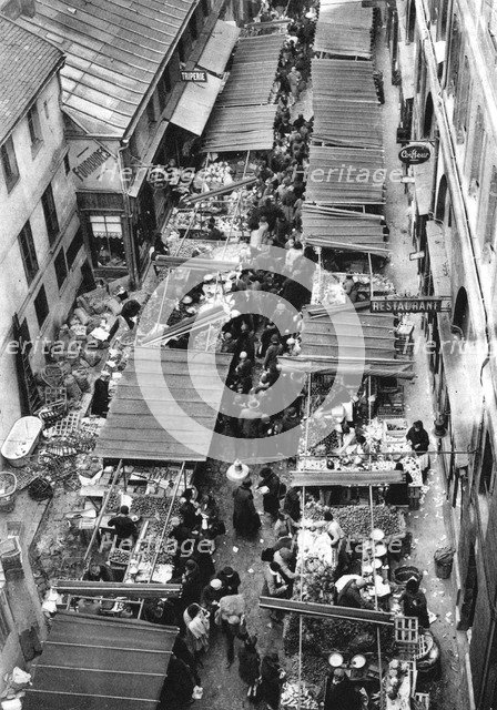 The picturesque market in Passage Berryer, Paris, 1931.Artist: Ernest Flammarion