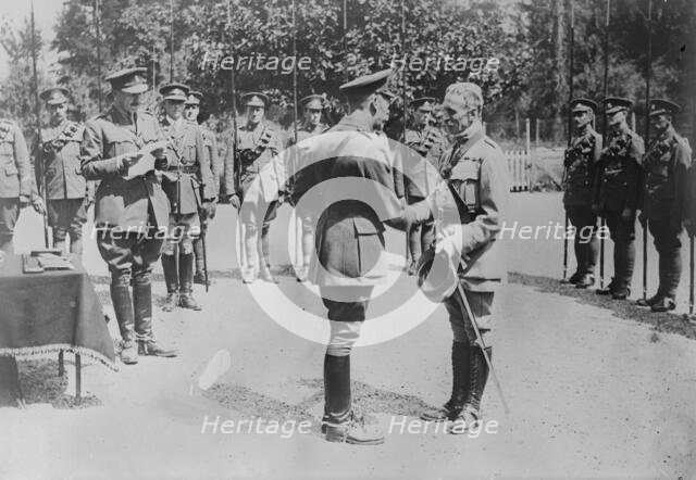 King Geo. decorates French Colonel, 7 Jul 1917. Creator: Bain News Service.