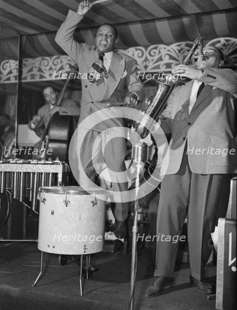 Portrait of Lionel Hampton and Arnett Cobb, Aquarium, New York, N.Y., ca. June 1946. Creator: William Paul Gottlieb.