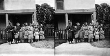 Fukien province, China: women and children outside a school (?), 1871. Creator: John Thomson.