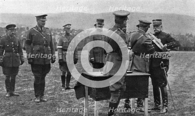 'Une ceremonie militaire a Salonique; Le general Sarrail decore par le general Mahon..., 1916. Creator: Unknown.